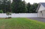 pvc vinyl fence on the side of residential home